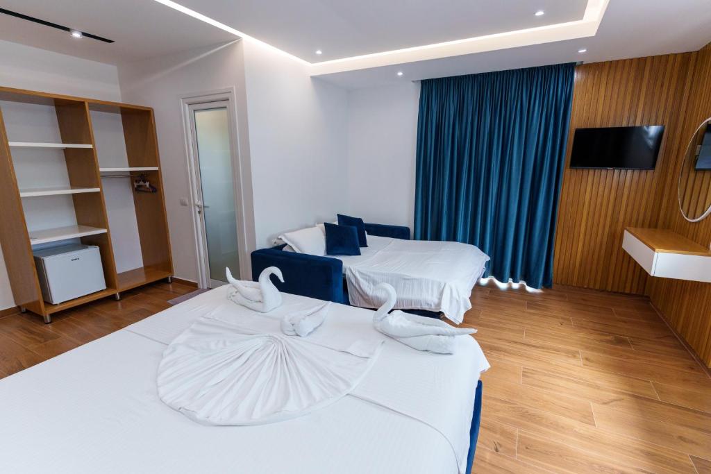 Letto o letti in una camera di Sea La Vie by Hotel Anna