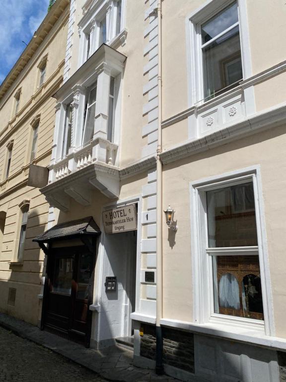 a building with a store front with a window at Hotel Bernkasteler Hof in Bernkastel-Kues