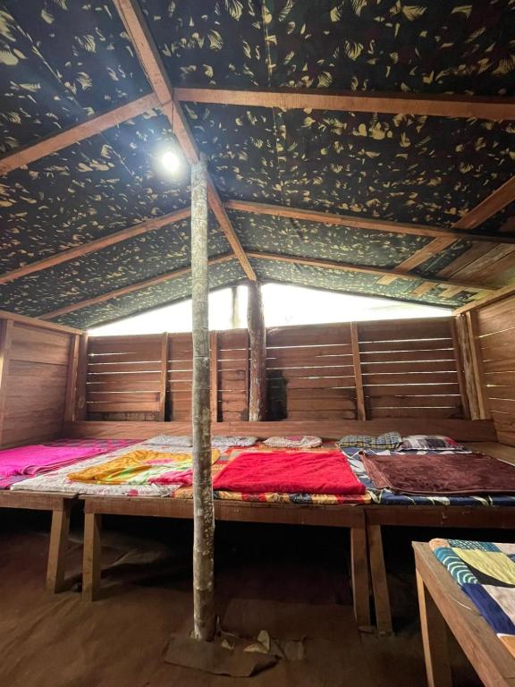 Voodi või voodid majutusasutuse Camptop Munnar toas