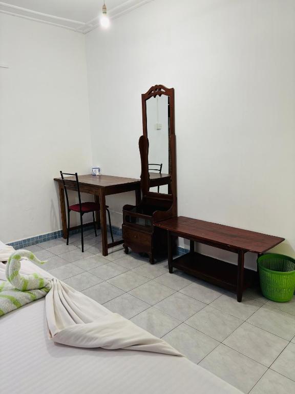 Postel nebo postele na pokoji v ubytování Levi's Tourist – Anuradhapura