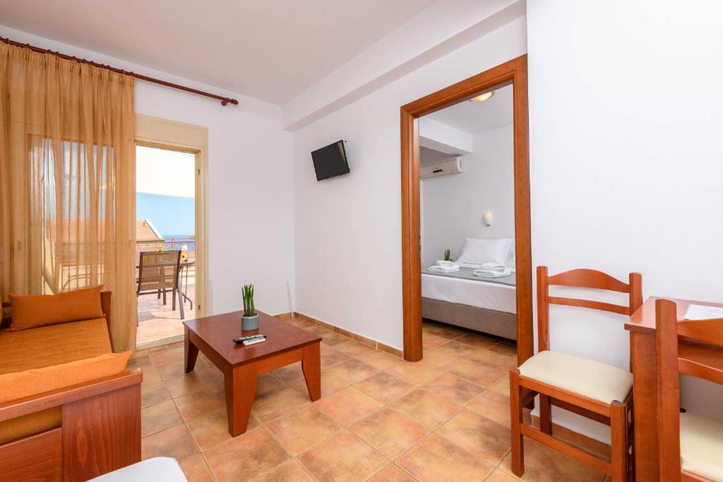 Postel nebo postele na pokoji v ubytování Villa Roxani