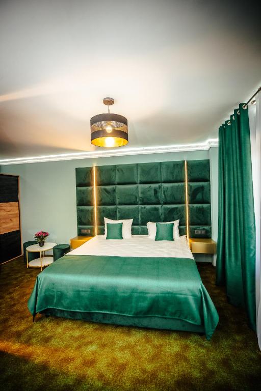 Postel nebo postele na pokoji v ubytování Fit Residence II