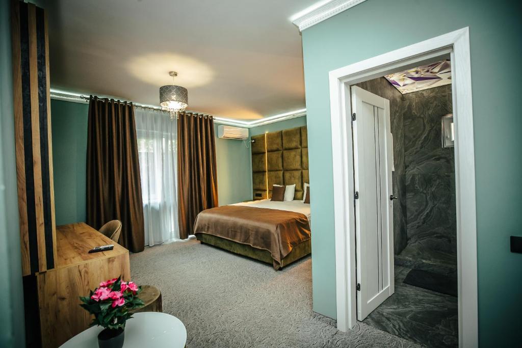 Postel nebo postele na pokoji v ubytování Fit Residence II