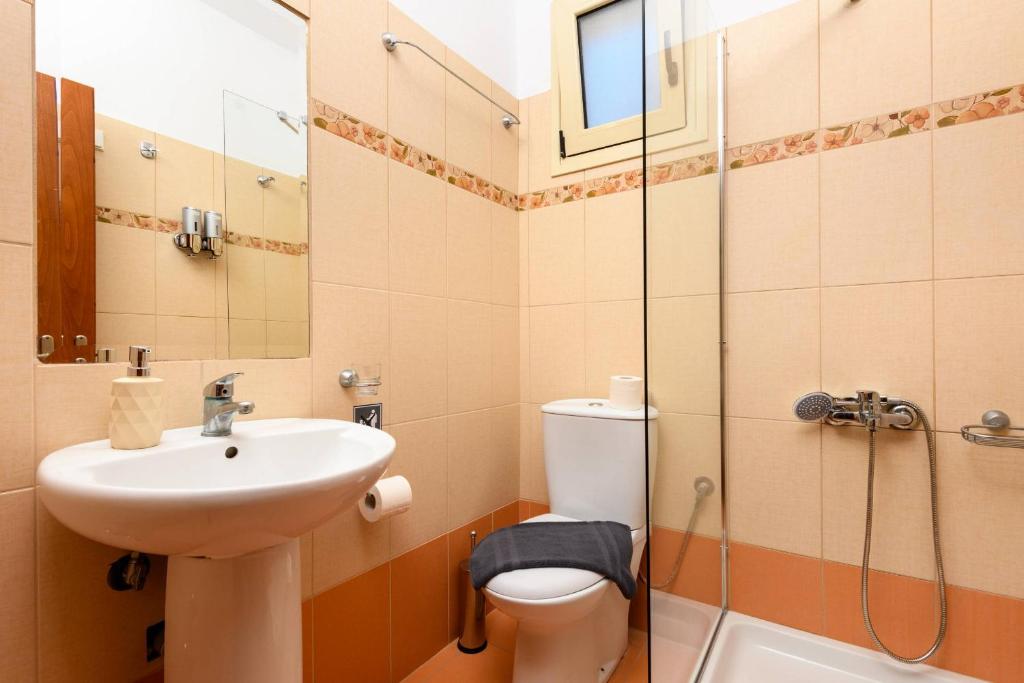 Koupelna v ubytování Villa Roxani