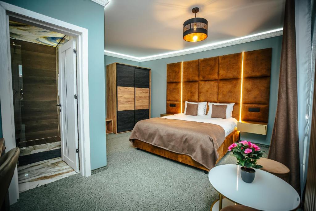 Postel nebo postele na pokoji v ubytování Fit Residence II