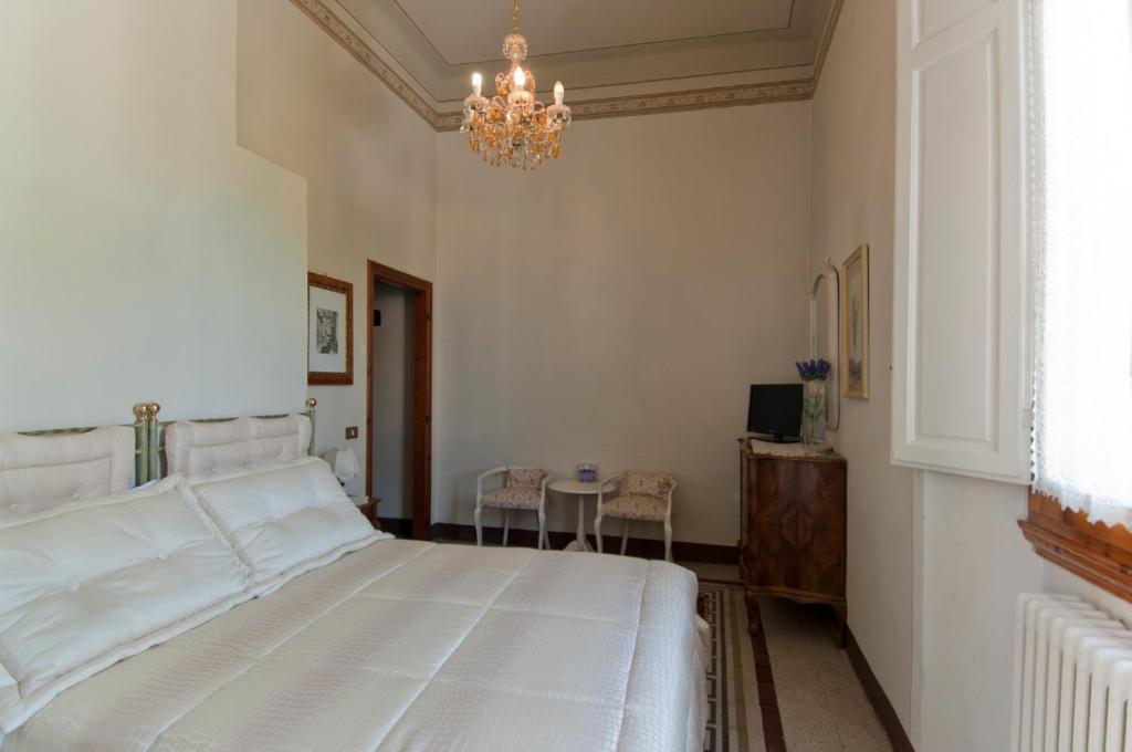 Postel nebo postele na pokoji v ubytování Cosetta Guest House