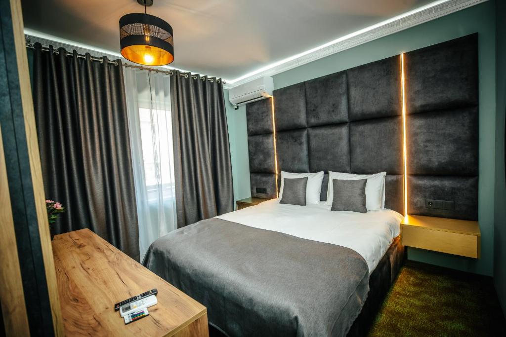 Postel nebo postele na pokoji v ubytování Fit Residence II