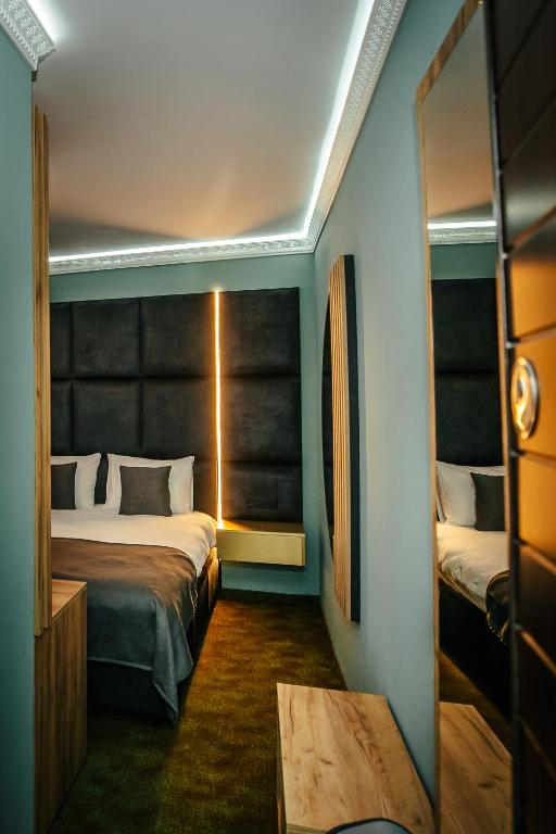 Postel nebo postele na pokoji v ubytování Fit Residence II