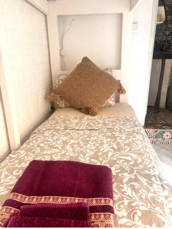 Postel nebo postele na pokoji v ubytování Riad Sanwa