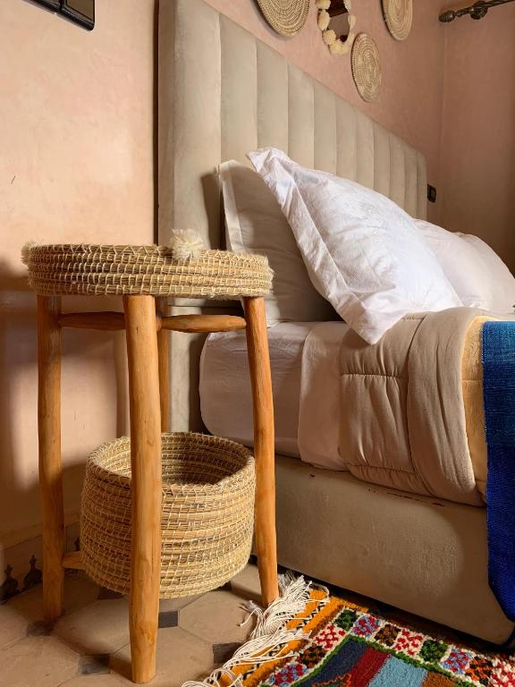Postel nebo postele na pokoji v ubytování auberge atlas tamatertt