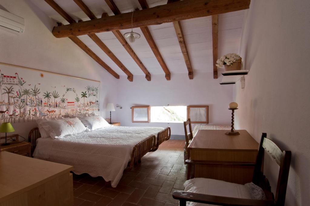 Postel nebo postele na pokoji v ubytování Cosetta Guest House