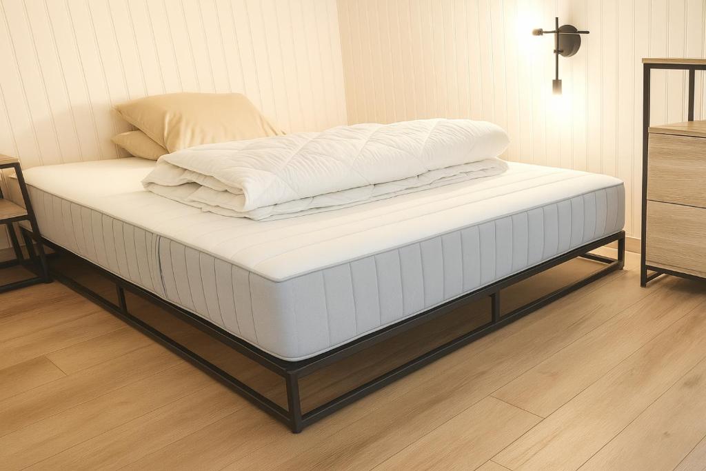 Un ou plusieurs lits dans un hébergement de l'établissement Ma Montagne Chic 4