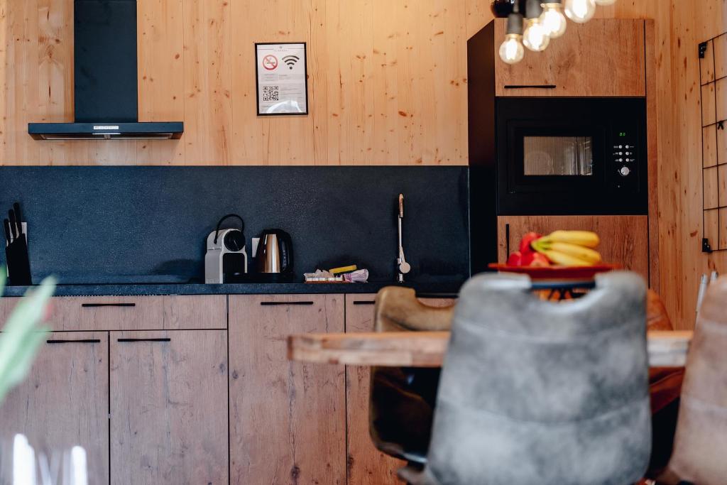 Kuchyň nebo kuchyňský kout v ubytování Clofers Relax Residences Rattendorf