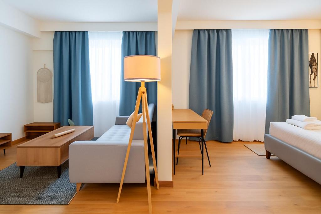 Ένα ή περισσότερα κρεβάτια σε δωμάτιο στο Niki Athens Suites - 404 - Cosy Apartment in Athens Historical Center