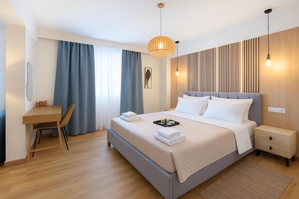 Ένα ή περισσότερα κρεβάτια σε δωμάτιο στο Niki Athens Suites - 404 - Cosy Apartment in Athens Historical Center
