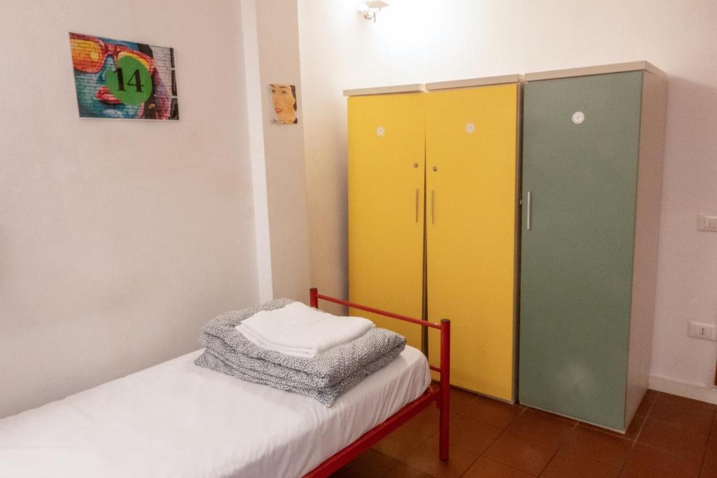 Postel nebo postele na pokoji v ubytování Hostel Il Nosadillo - Bologna