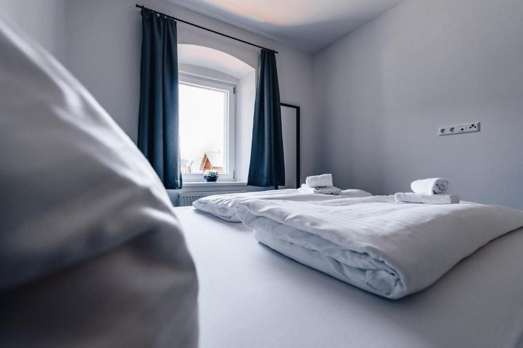 Postel nebo postele na pokoji v ubytování Clofers Relax Residences Rattendorf