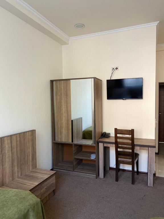TV a/nebo společenská místnost v ubytování Mina Hotel