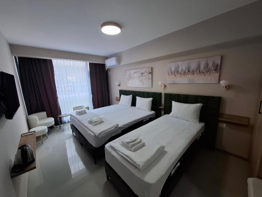 Postel nebo postele na pokoji v ubytování Hotel CENTRAL