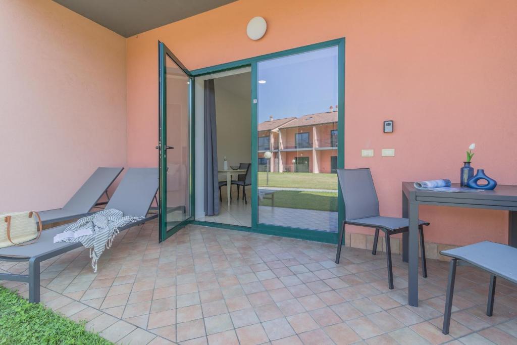 Un balcón o terraza en Brezza del lario Bilocale by Varenna Holidays