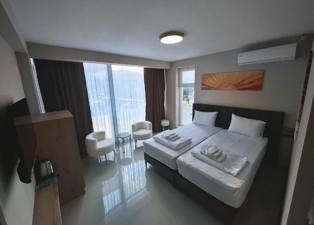 Postel nebo postele na pokoji v ubytování Hotel CENTRAL