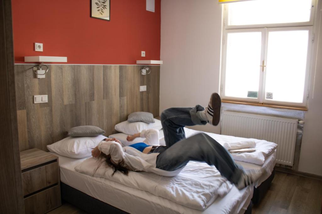 Postel nebo postele na pokoji v ubytování Prague Dream Hostel