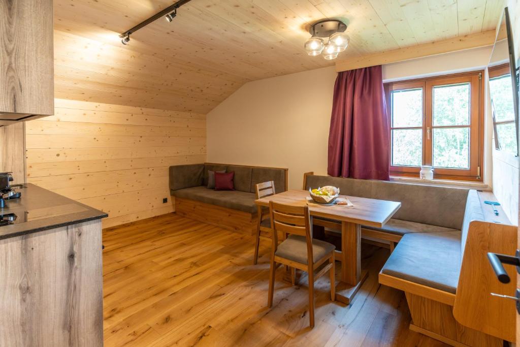 Posedenie v ubytovaní Madlhof