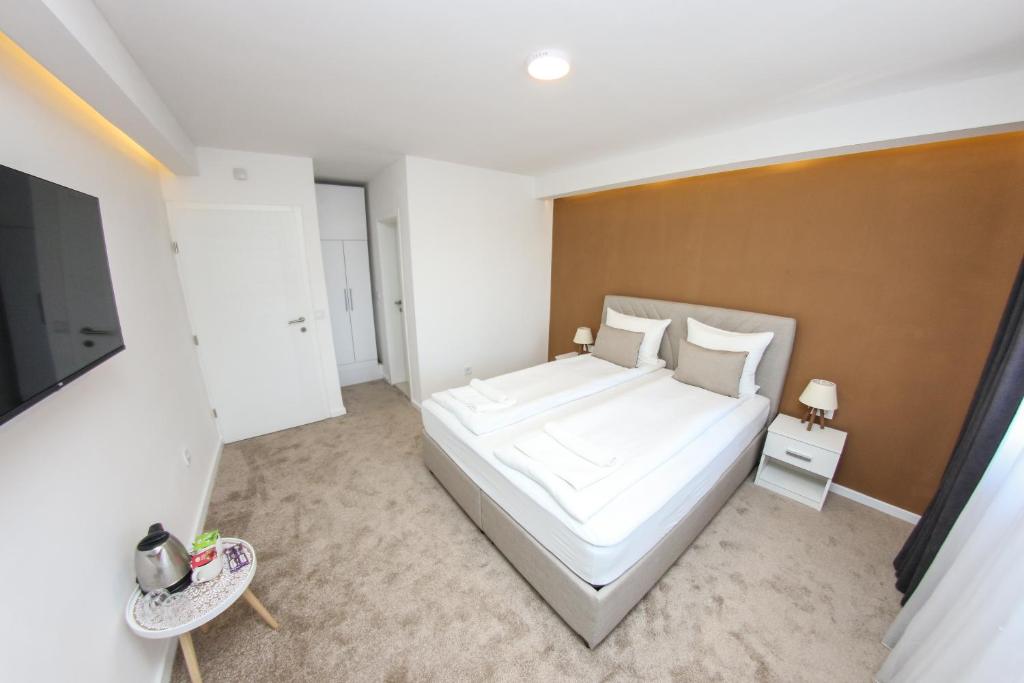 Łóżko lub łóżka w pokoju w obiekcie Guest House LIKE