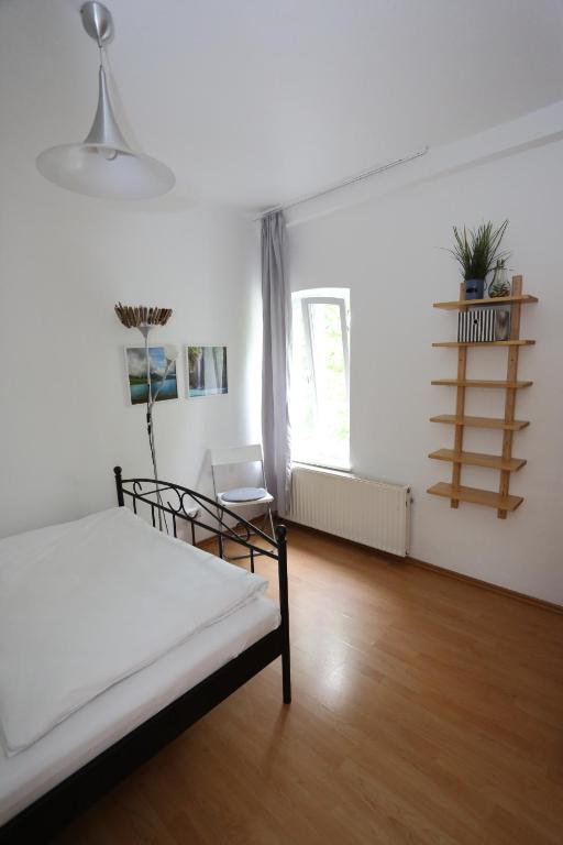 Ένα ή περισσότερα κρεβάτια σε δωμάτιο στο Hostel Westküste