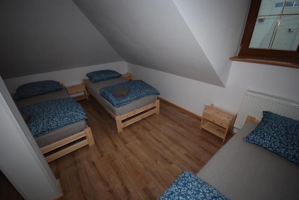 Noclegi Dywity Spółdziecza 10 - Familiekamer