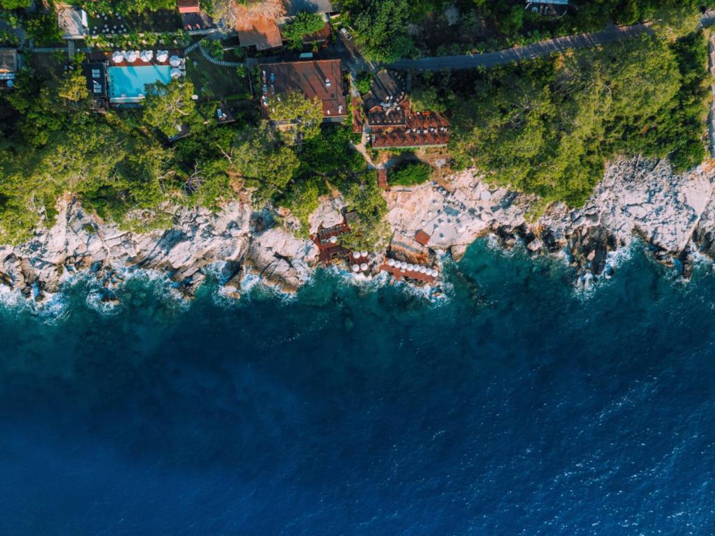 an aerial view of a beach with the ocean at Lov Faralya Adults Only in Faralya