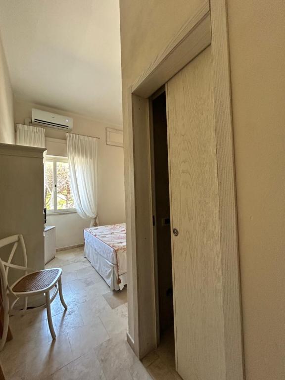 Postel nebo postele na pokoji v ubytování Hotel Bagni Lido