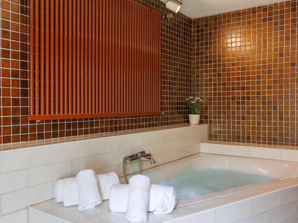 Koupelna v ubytování Chalet Lò Batcho by Interhome