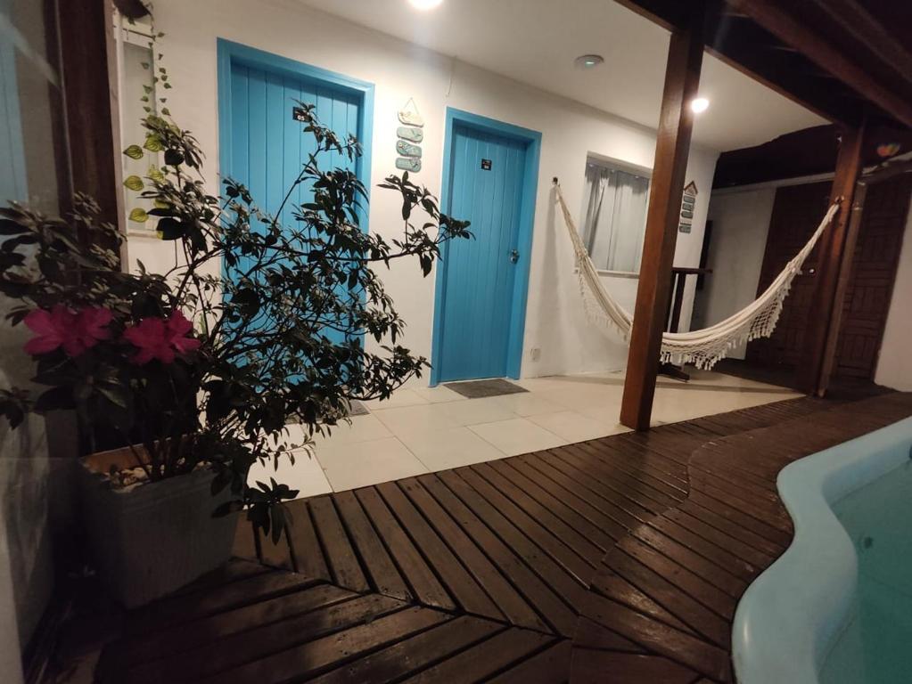 Postel nebo postele na pokoji v ubytování Suítes Paraty