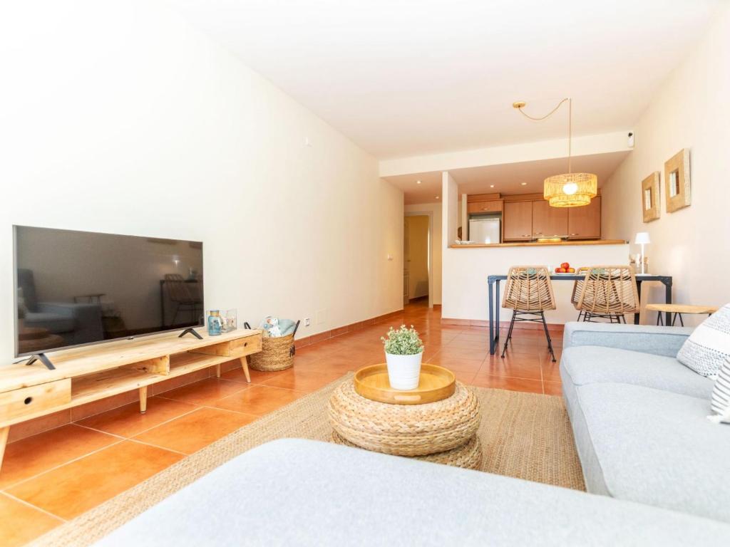 A television and/or entertainment centre at Apartment Green Mar H by Interhome
