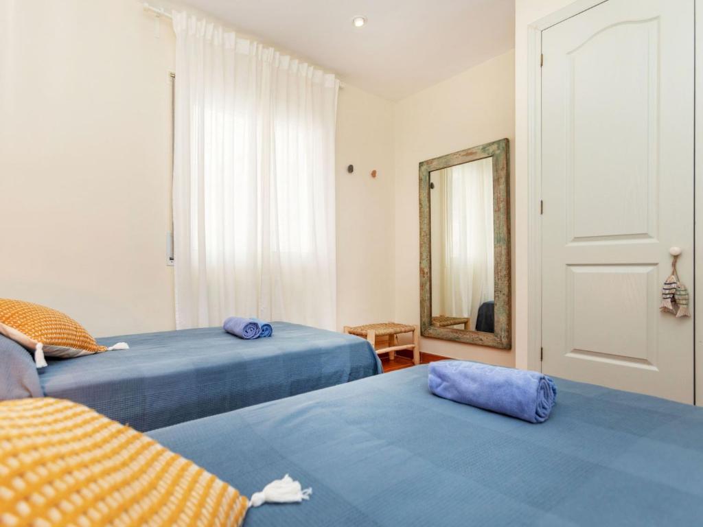 A bed or beds in a room at Apartment Green Mar H by Interhome
