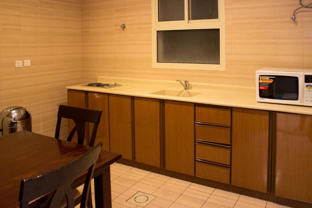 Traveller Inn Serviced Apartments - Economy - ２ベッドルームのあるアパート