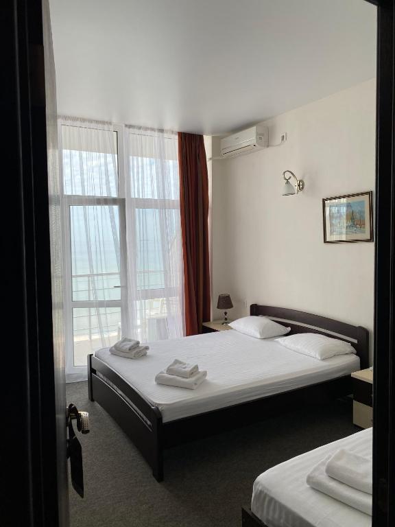 Postel nebo postele na pokoji v ubytování Berizka Park Hotel