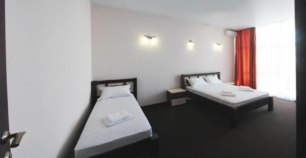 Postel nebo postele na pokoji v ubytování Berizka Park Hotel