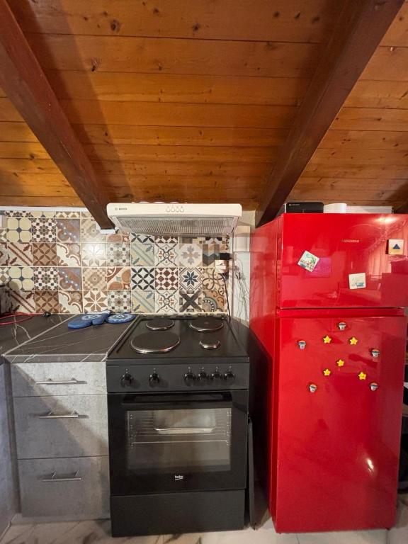 Kuchyň nebo kuchyňský kout v ubytování HELEN STUDIOS Loft