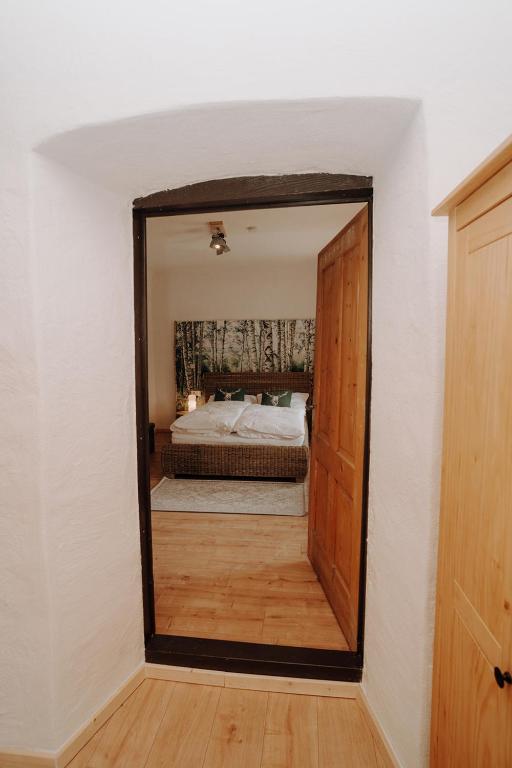 Postel nebo postele na pokoji v ubytování Der SteinStadL