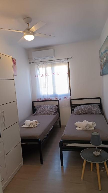 Postel nebo postele na pokoji v ubytování Apartman Marica