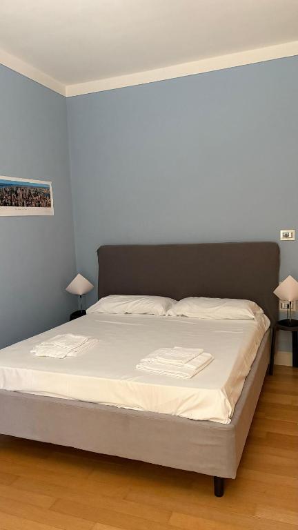 Łóżko lub łóżka w pokoju w obiekcie Villa Rita