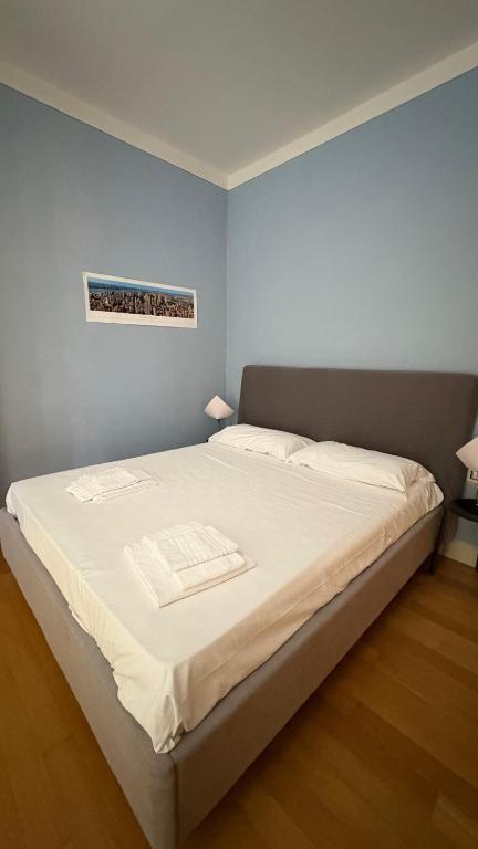 Łóżko lub łóżka w pokoju w obiekcie Villa Rita