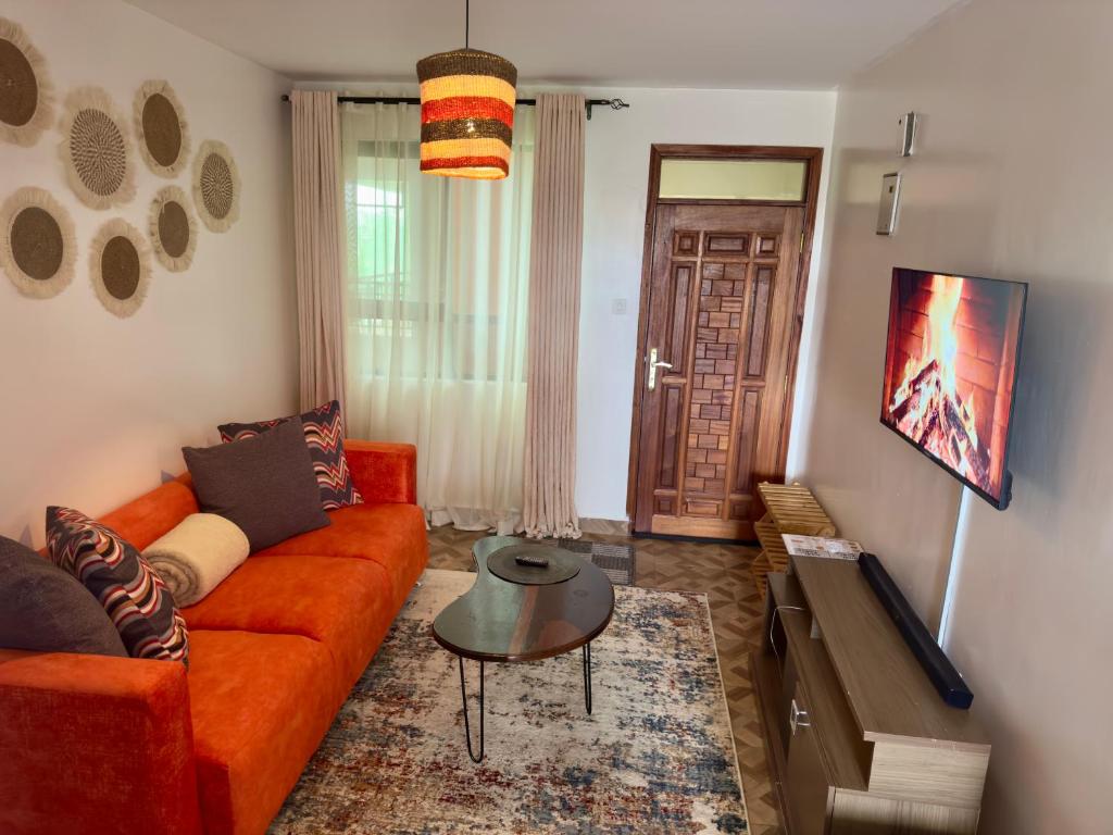 TV a/nebo společenská místnost v ubytování Express Suites near JKIA Airport