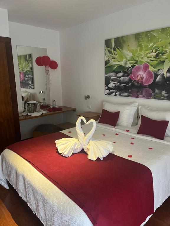 Postel nebo postele na pokoji v ubytování Hotel Eco Salvador