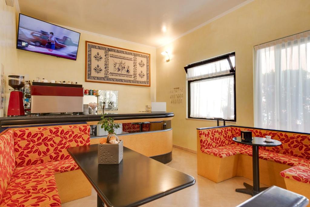 Kuchyň nebo kuchyňský kout v ubytování Hotel Numi
