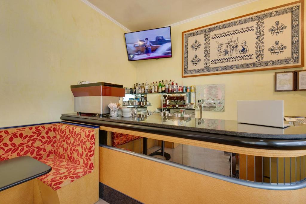 TV a/nebo společenská místnost v ubytování Hotel Numi