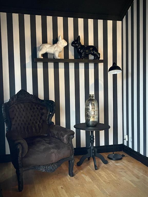 Posezení v ubytování Hotell Vaxblekaregården