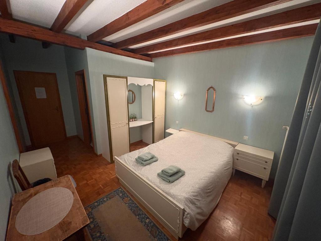 Postel nebo postele na pokoji v ubytování Chambres d'hôtes Monicala